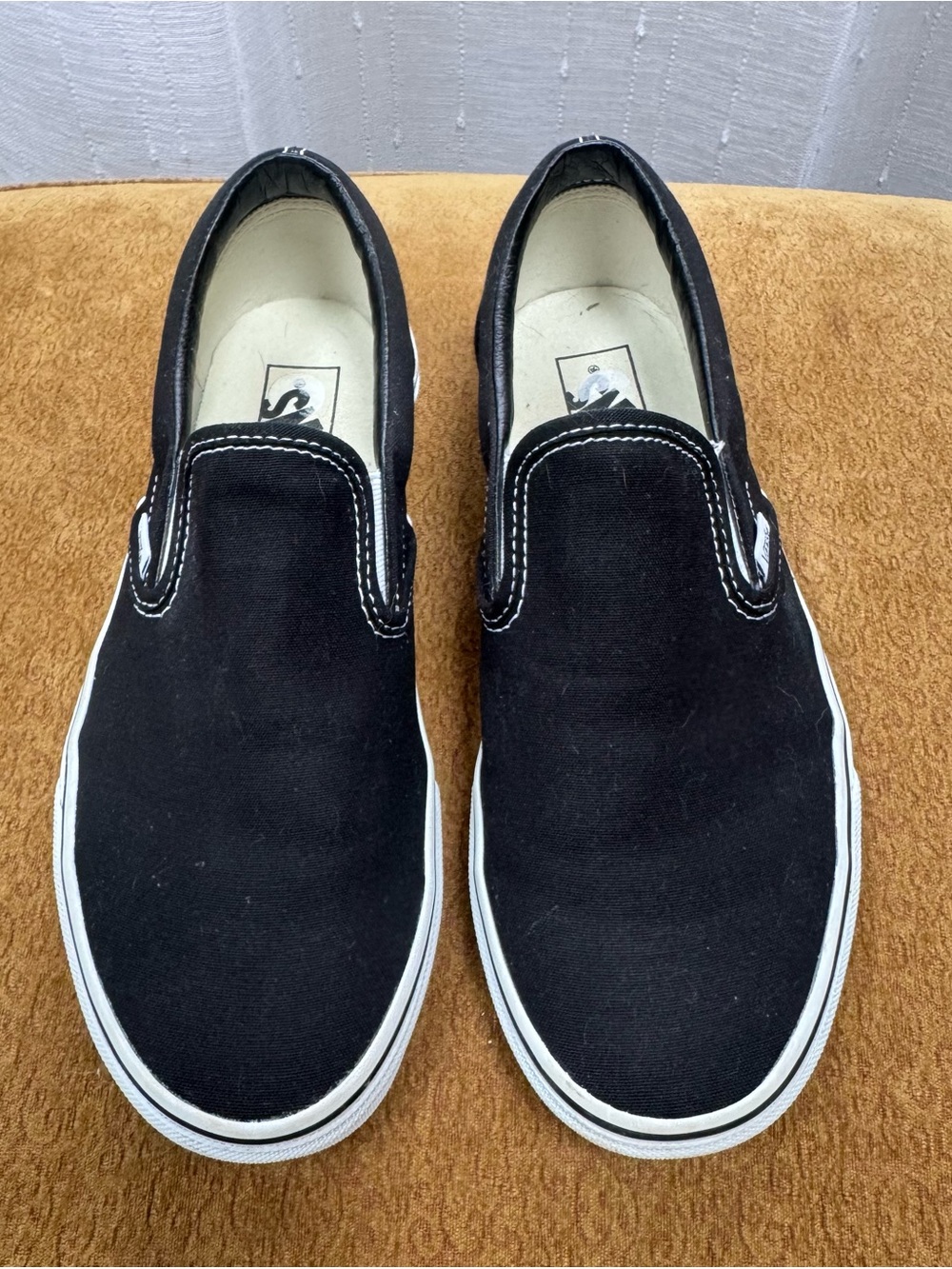 Vans Sz men’s 9/womens 10.5 Black Canvas Slip-On Sneakers with White Sole